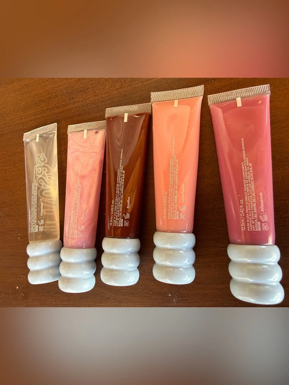 New! Kosas Lip Pulse Gloss Set — Pink, Peach, Brown, Shimmer & Clear